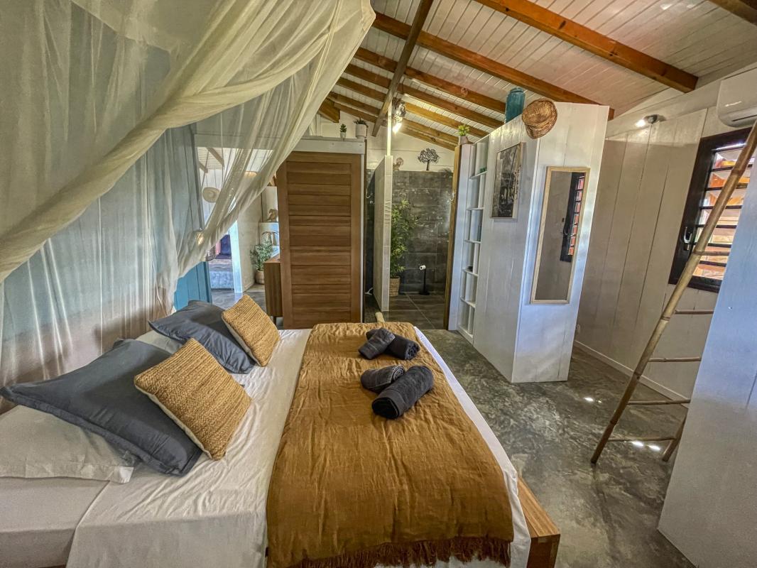 26 Location villa piscine vue mer Pointe Noire Guadeloupe_chambre 1